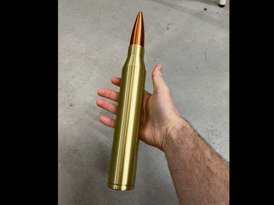 BIG BERTHA .50 cal holds up to 36 coins in capsules!