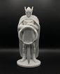Statue of a warrior holding a sword and shield on a black background