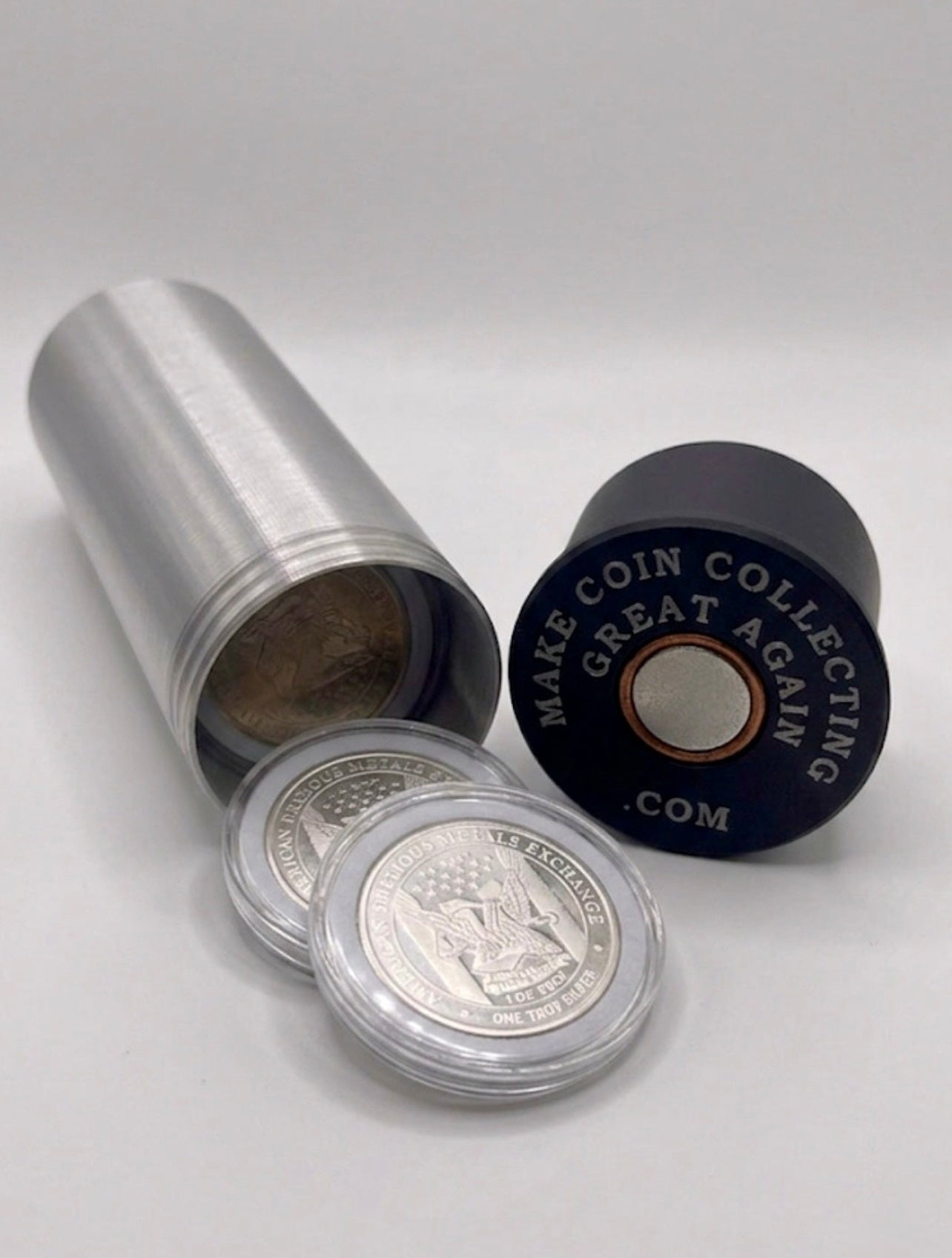 XL SHOTGUN SHELL COIN HOLDER FOR 1 OZ ROUNDS/COINS IN A FOAM CAPSULE! SILVER AND BLACK COLOR SCHEME.